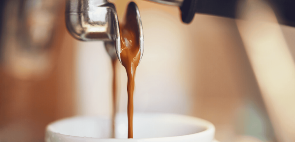 Barista pulling shot from freshly ground Brazil single origin